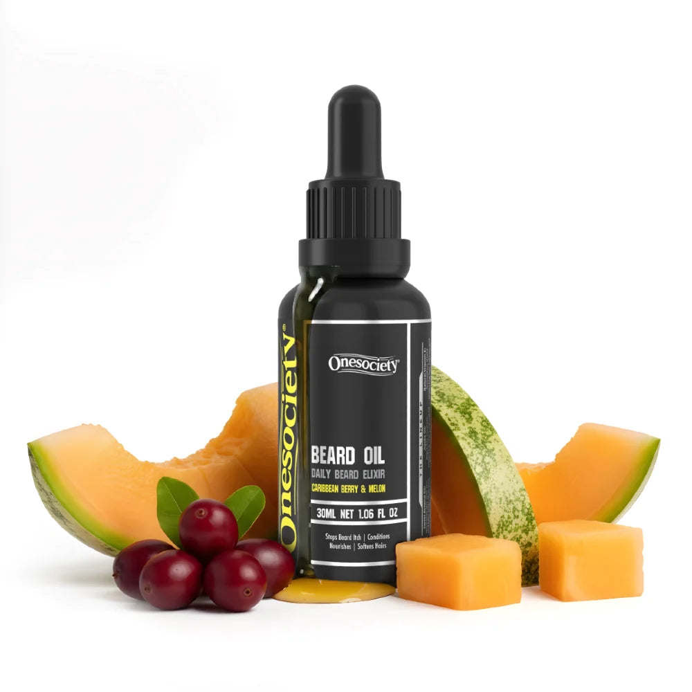 Bottle of Onesociety beard oil with cantaloupe, honeydew, and cranberries on a white background