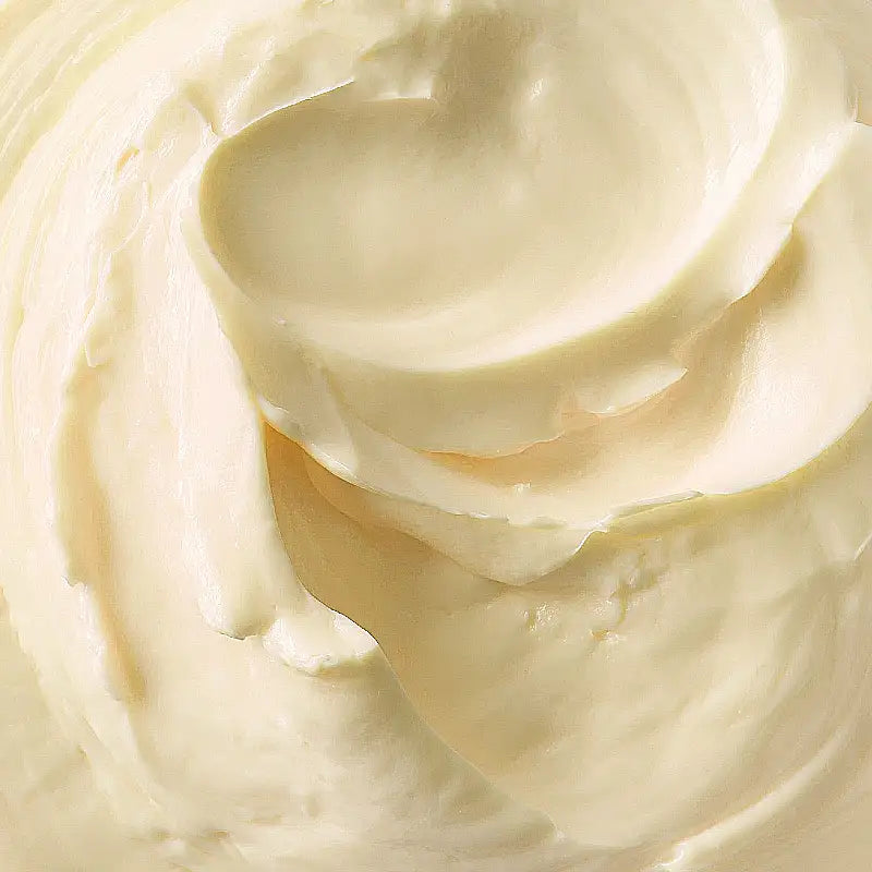 Close-up of creamy white body butter