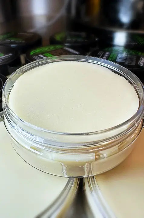 Beard Balm tub with one society lemongrass beard balm in the background