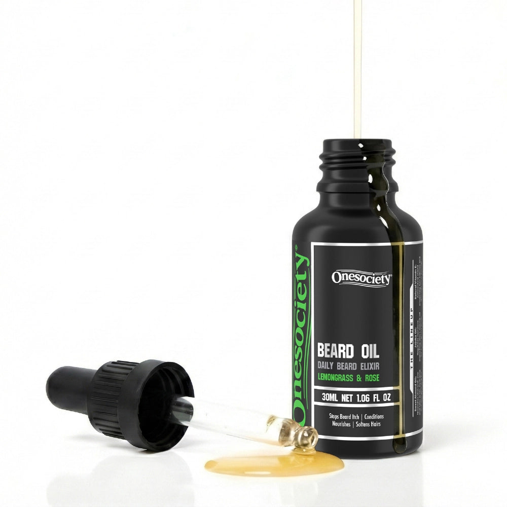 Lemongrass and rose beard oil by one society with pipette off and oil spilling down