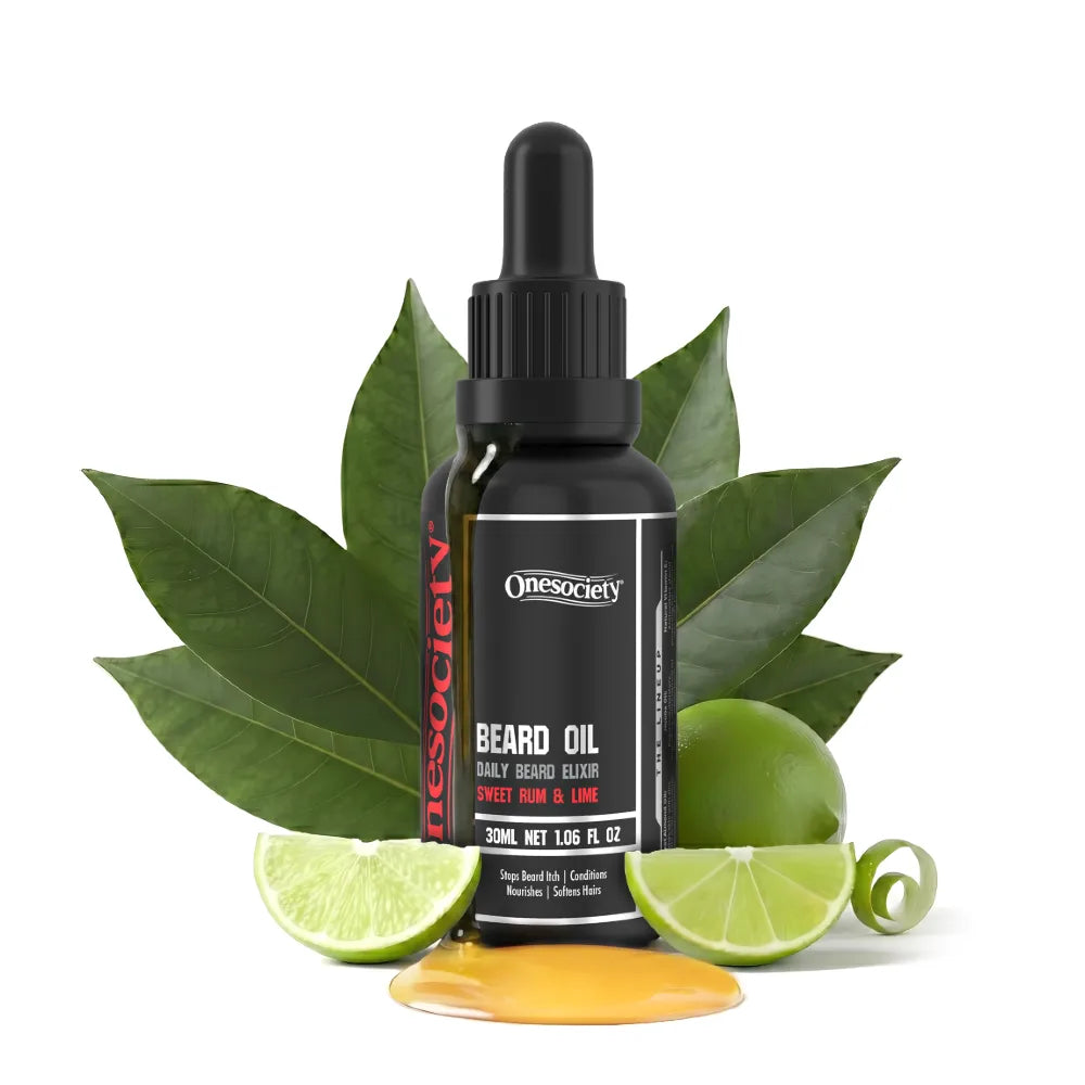 Bottle of Onesociety beard oil with lime slices and leaves on a white background