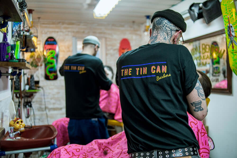 The Tin Can Barbers in Brighton, Cutting hair using One Society Men's Grooming Products.