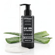 A bottle of Onesociety Aloe Vera Face Moisturiser standing upright on a white background, with a white cream pool at its base and aloe vera slices arranged behind it.