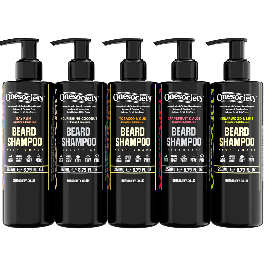 Natural Beard Shampoo Products in a line, Bay Rum, Nourishing Coconut, Tobacco and Oud, Grapefruit and Aloe Vera, Cedarwood and Lime Beard Shampoos made by One Society Men's Grooming Products