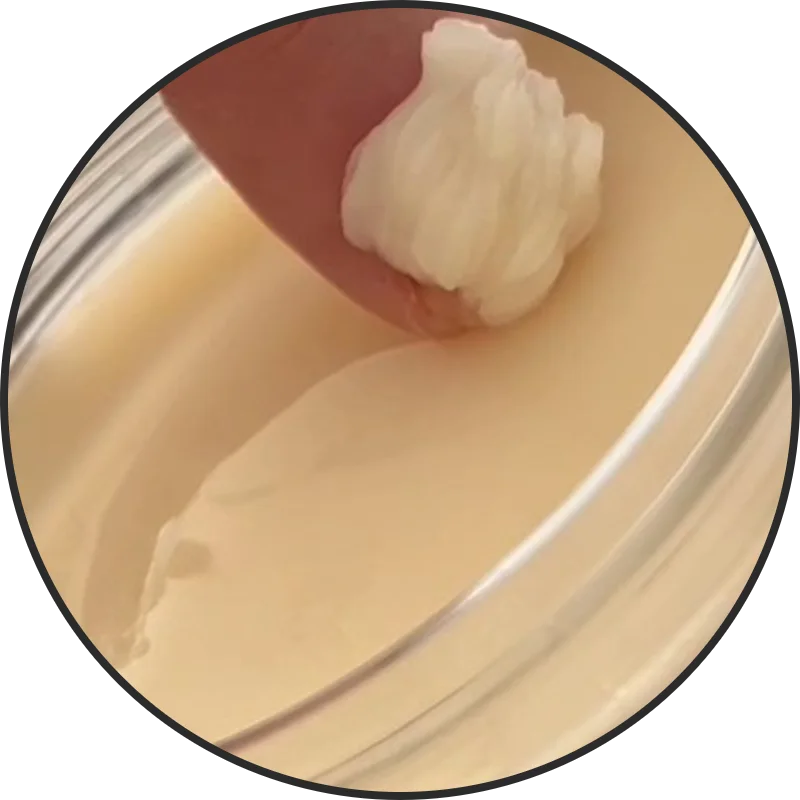 finger taking beard balm out of tub