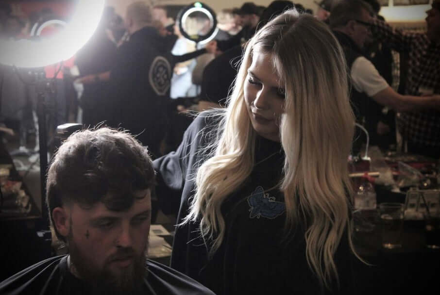 Emily Rose the Barber looking nice with long blonde hair at the great British barber bash.