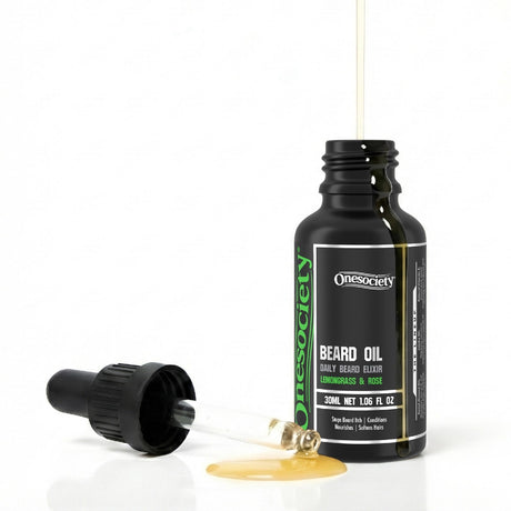 Lemongrass and rose beard oil by one society with pipette off and oil spilling down