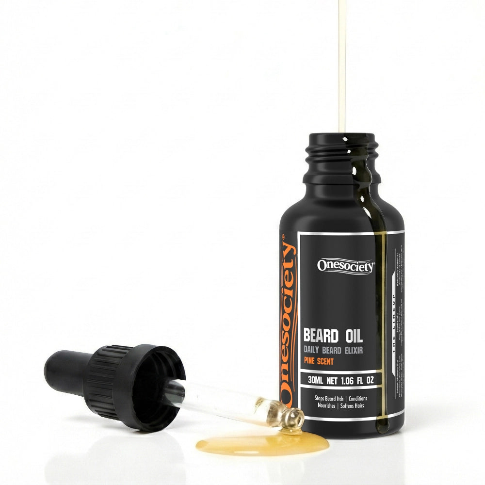 Pine beard oil by one society with pipette off and oil spilling