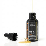 Pine beard oil by one society with pipette off and oil spilling