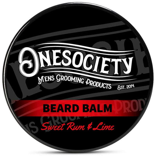 Onesociety strong holding men's beard balm. A Rich and Warming Aroma with a Blast of Zest.