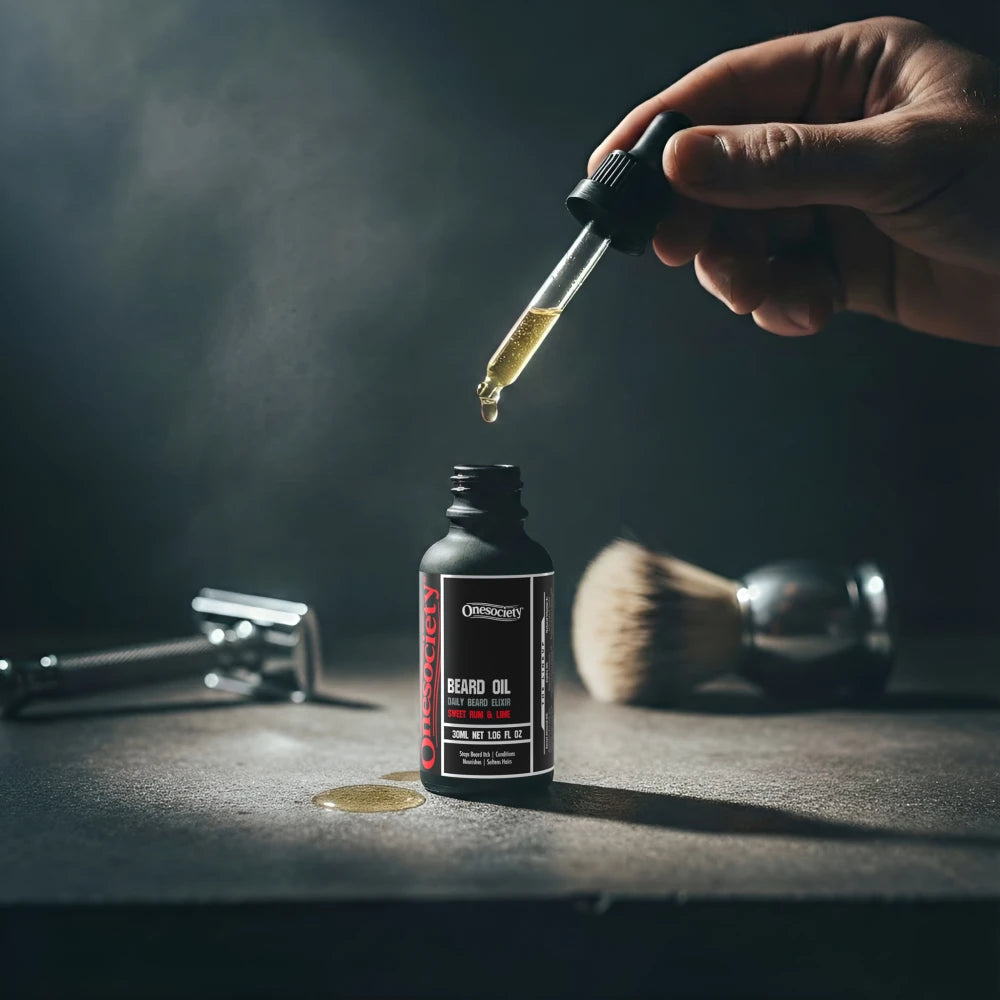 Sweet rum and lime beard oil by one society with lid off and shaver in the background