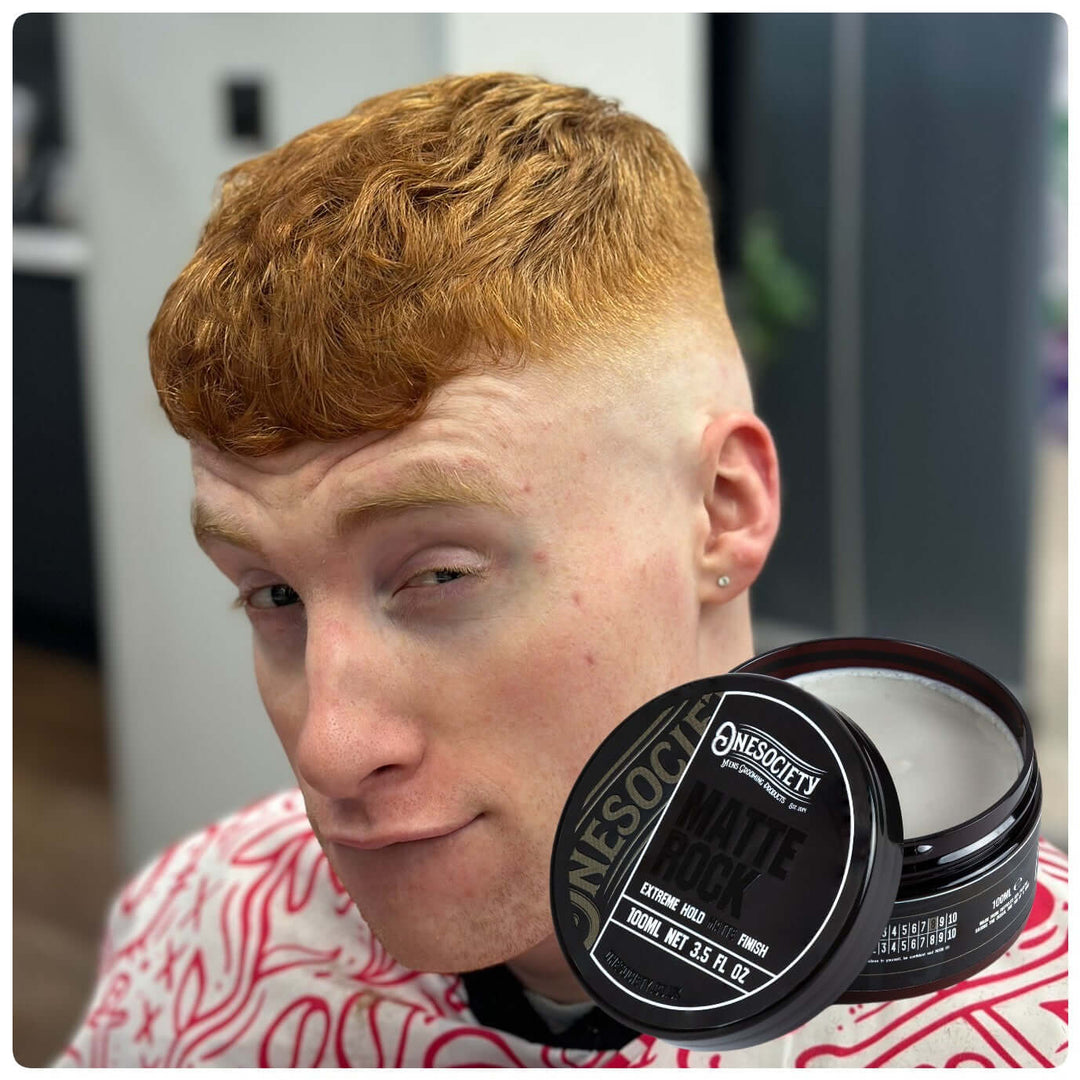 Ginger mid skin fade haircut in One Society Barbershop Crawley