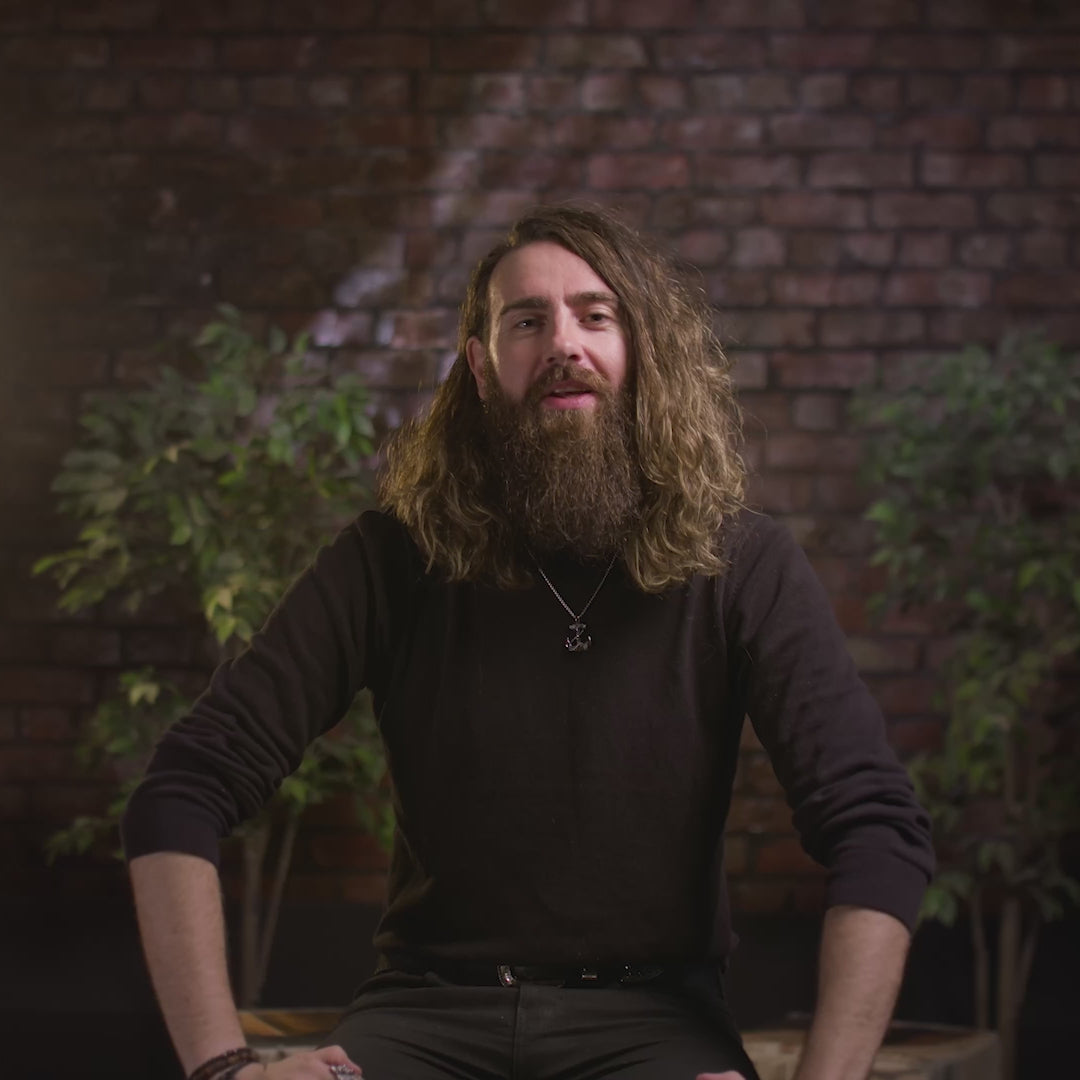 The video features the "90-day beard challenge" presented by Adam Brown. The speaker notes that the beard may be feeling thicker and less itchy. The speaker confirms that the viewer is sticking to the challenge and doing well, being 30 days in.
